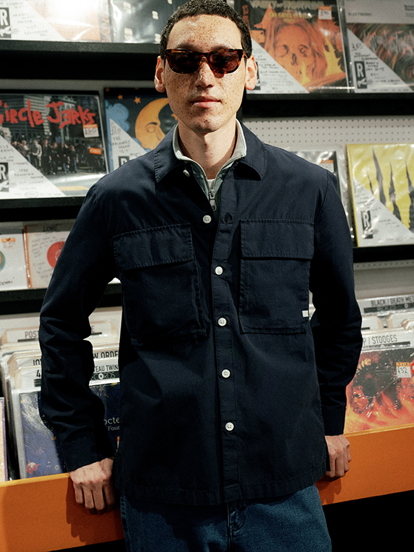 Model Wearing a Farah Black Button Up Shirt