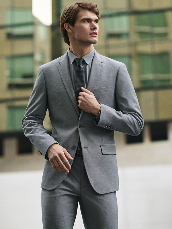 Model in Perry Ellis Suits Collection in Navy